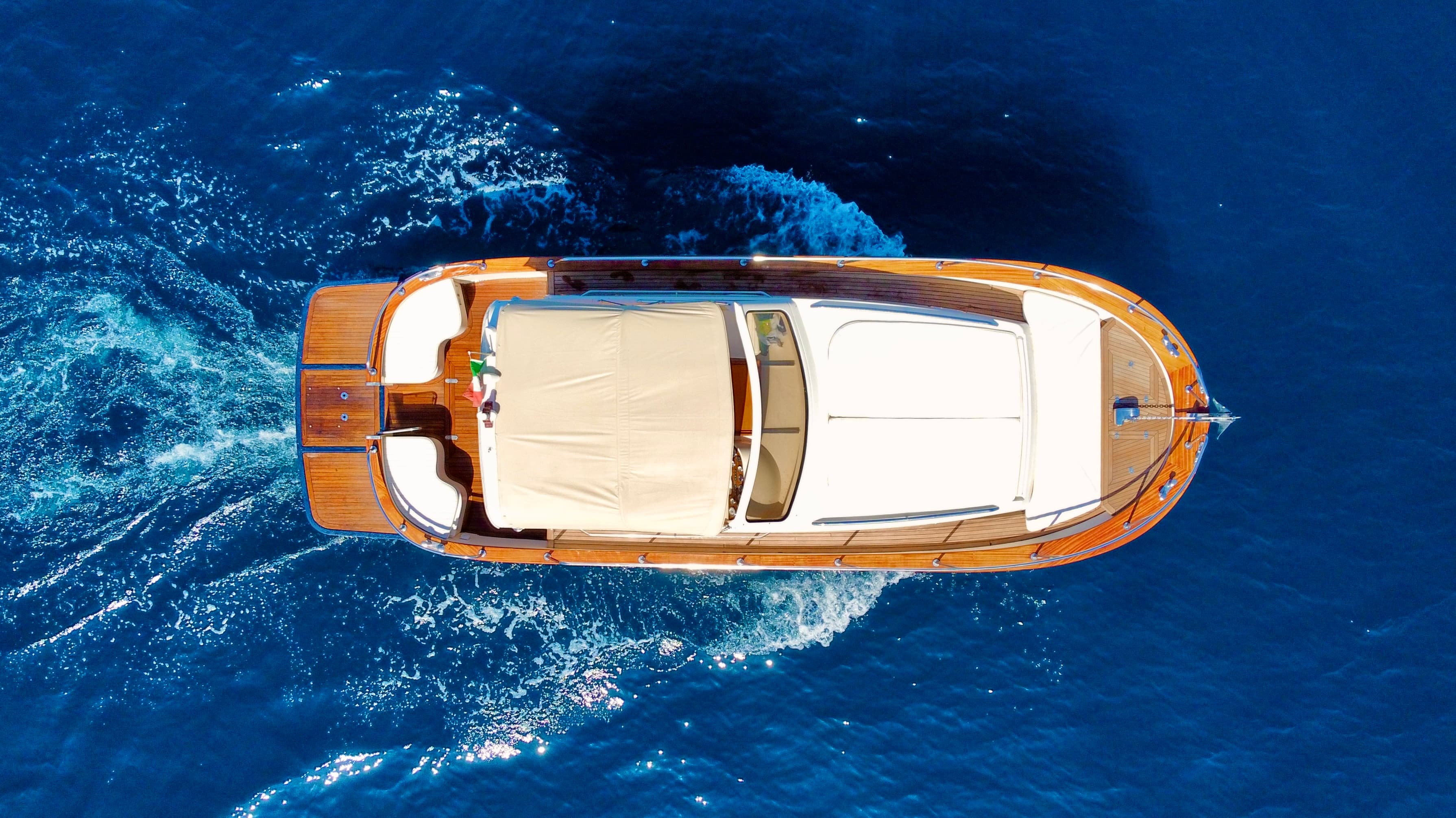 Gozzo 32 boat with sun deck near Capri